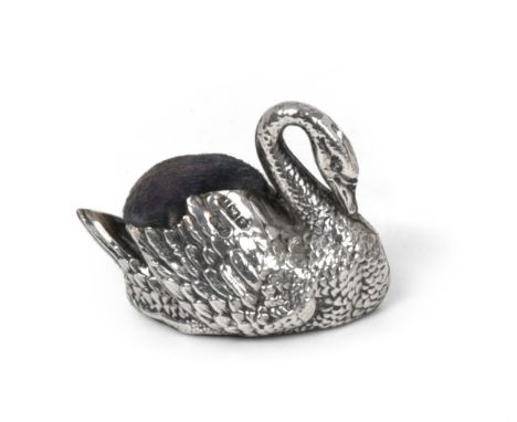 An Edward VII Silver Pin-Cushion, by Levi and Salaman, Birmingham, 1905, realistically modelled as a swan, filled, 5.5cm long