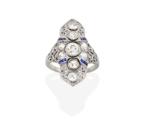 An Art Deco Style Sapphire and Diamond Ring, a plaque positioned up the finger, formed of old cut diamonds and calibré cut sa