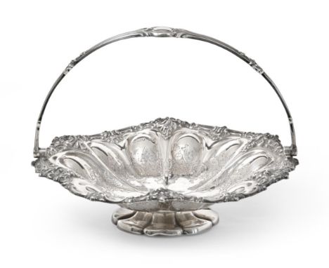 A Victorian Silver Basket, by Henry Wilkinson and Co., London, 1864, shaped circular and on spreading foot, with openwork cas