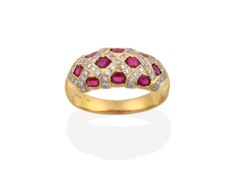 An 18 Carat Gold Synthetic Ruby and Diamond Ring, the domed top inset with oval cut synthetic rubies in eight-cut diamond set