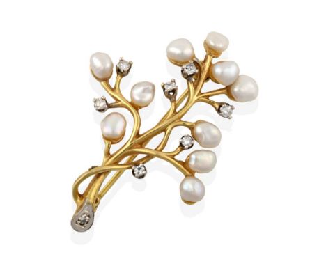 A 9 Carat Gold Cultured Pearl and Diamond Brooch, the yellow floral spray set throughout with irregular shaped cultured pearl