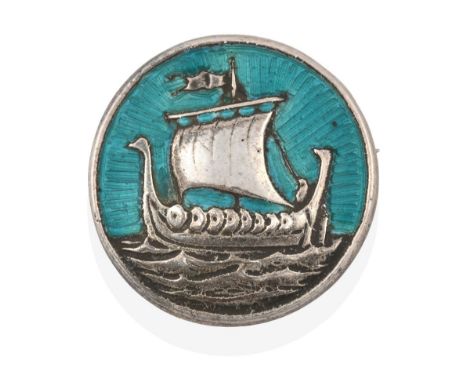 An Enamel Iona brooch, by Alexander Ritchie, the circular plaque depicting a Viking ship and the sky enamelled in turquoise, 