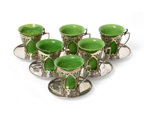 A Set of Six Edward VII Silver and Glass Demitasse-Cups and Saucers, by The Goldsmiths and Silversmiths Co. Ltd., London, 190