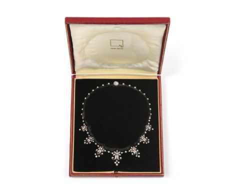 An Edwardian Diamond Necklace/Tiara, circa 1900, the front graduated with seven floral scrolled drops set throughout with old