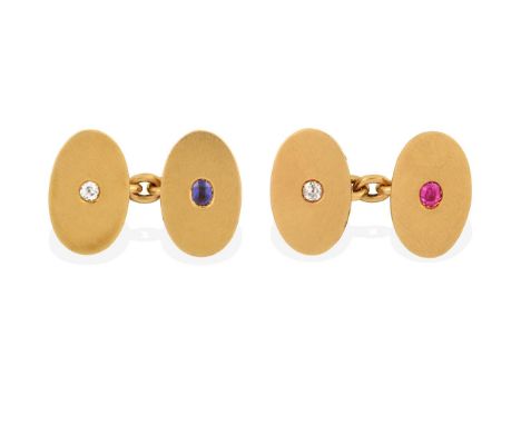 A Pair of Gem Set Cufflinks, the yellow chain linked oval plain polished plaques each inset with a gemstone centrally, one cu