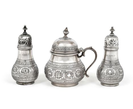 A Three-Piece Victorian Silver Condiment-Set, by George Fox, London, 1864 and 1865, each piece chased with the signs of the z