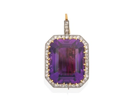 An Amethyst and Diamond Brooch/Pendant, the emerald-cut amethyst in a yellow claw setting, within an old cut diamond border i