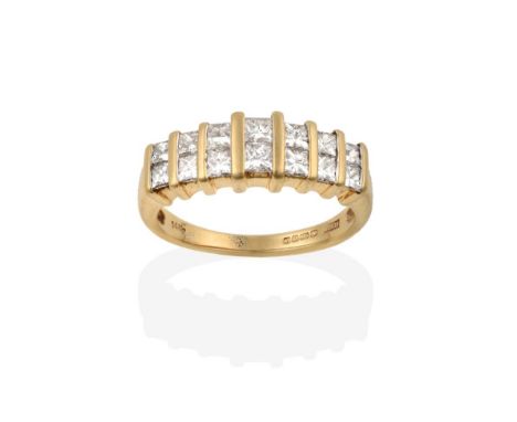 A 14 Carat Gold Diamond Half Hoop Ring, the two rows of graduated princess cut diamonds spaced by yellow polished bars, to a 