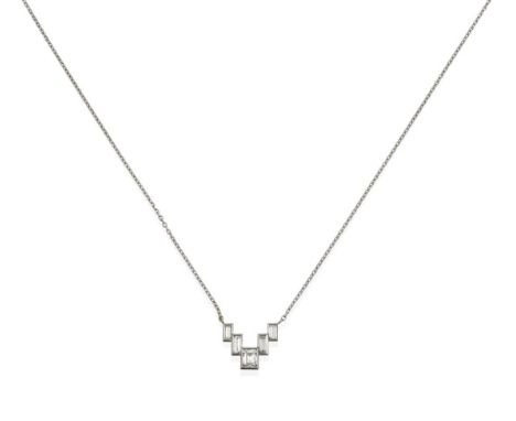 A Diamond Necklace, mounted by Cartier, five graduated step cut diamonds in white rubbed over settings, to a trace link chain