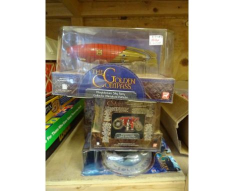 A selection of 4 boxed Golden Compass collectables, good