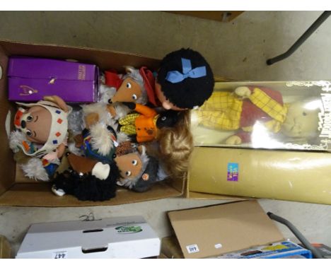 A collection of approximately 10 figures, mostly TV and film related, including Wombles, Rupert, Magic Roundabout, a Winnie T