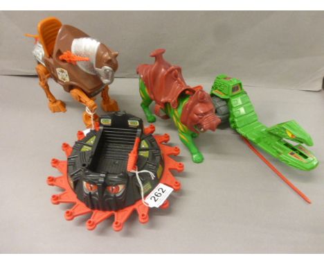Four Mattel He Man Masters of the Universe accessories to include Battle Cat, Road Ripper, Roton and Stridor