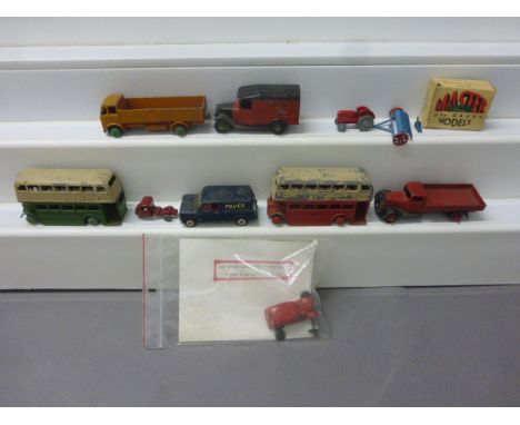 Group of eight early diecast model vehicles to include Dinky, Corgi, boxed Master OO Gauge Models no 82 Tractor & Rake etc (p