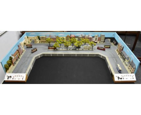 A scratch built tramway layout, with accessories inc eight different trams, full back drop scenery, trees, people, vehicles, 