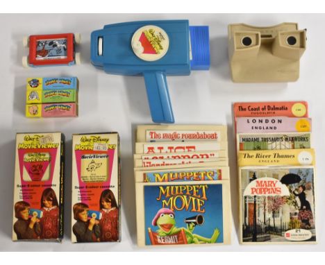Cartoons - a Mettoy Walt Disney Movie Viewer, three super 8 cassettes 7511 Pinnochio, 7513 Bambi, 7616 Goofy;  a Viewmaster a
