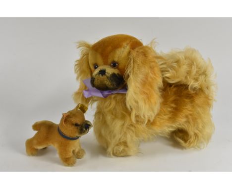 Steiff Animals -  a vintage Pekinese dog, yellow tag and button, standing 22.5cm high;  another Boxer Puppy, yellow tag and b