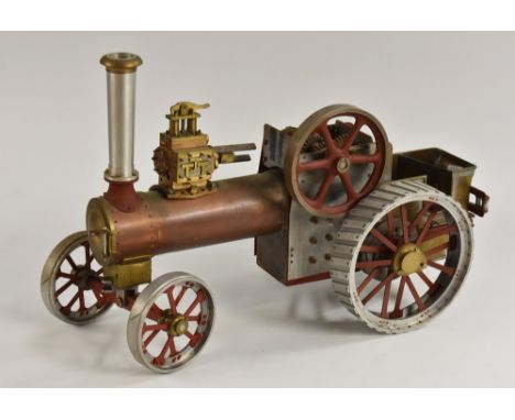 A 1 inch scale live steam model traction engine, Minnie, steel brass and mixed metal body, aluminium wheels, open slide gears