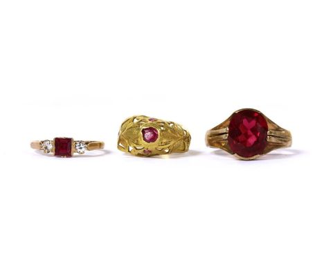 A 9ct gold single stone synthetic ruby ring, Dublin 1970, together with a gold three stone paste ring, tested as approximatel