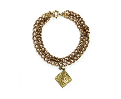 A gold two row curb link bracelet, with bolt ring clasp, suspending a 9ct gold St. Christopher charm, bracelet tested as appr