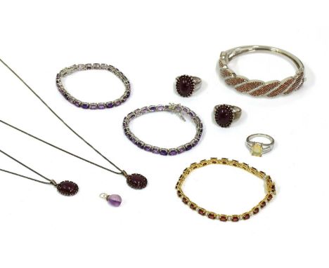 A quantity of silver gem set jewellery, to include two silver amethyst line bracelets, two silver ruby and garnet pendant and