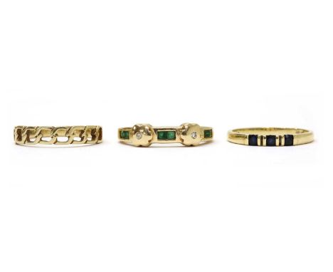 Three gold rings, to include a chain link design ring with plain shank, a three stone sapphire ring, and an emerald and diamo