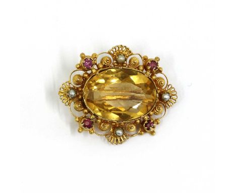 A Regency gold citrine, split pearl and ruby brooch, with an oval mixed cut citrine, claw set, to milled wire surround claw s