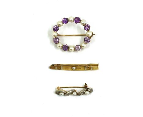 Three gold brooches, to include a gold pearl set lingerie pin, with pin and visor catch, tested as approximately 18ct gold, 1