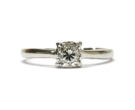 A white gold single stone diamond ring, with a brilliant cut diamond, with an estimated weight of approximately 0.38ct, grain