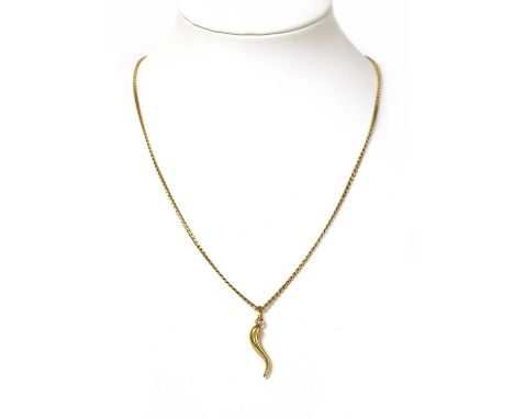 An Italian gold cornicello pendant, suspended on an 'S' link chain, marked 750, tested as approximately 18ct gold, 8.59gCondi