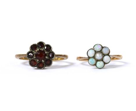  A gold and silver, split pearl and opal cluster ring, with a central split pearl, a later replacement, to surround of round 