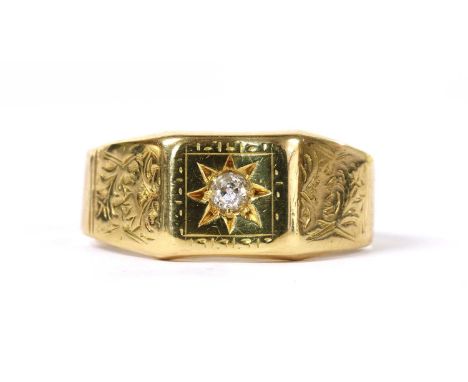 An 18ct gold star set diamond ring, with an old European cut diamond star set to the square head, to tapered engraved shoulde