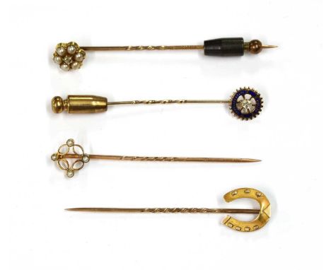 Five gold stick pins, to include a horseshoe stick pin, and split pearl stick pin, and a removable diamond and split pearl cl