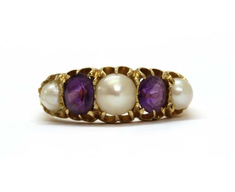 A gold split pearl and amethyst five stone ring, with a graduated row of split pearls and oval mixed cut amethysts, claw set,