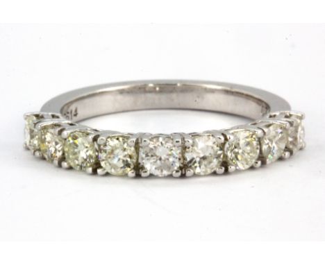 An 18ct white gold (stamped 750) ring set with nine brilliant cut diamonds, approx. 1.46ct, (M.5).