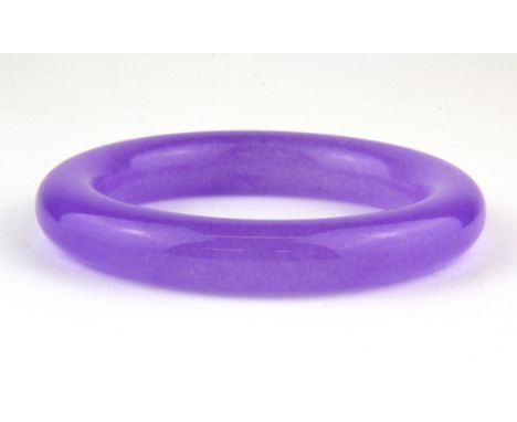 A lavender jade bangle, Dia. 9cm.