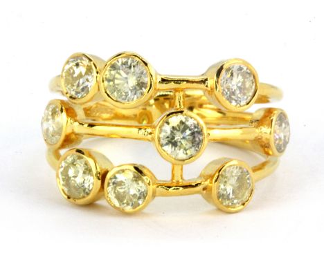 A 14ct yellow gold ring set with fancy yellow diamonds, approx. 1.8ct (O).