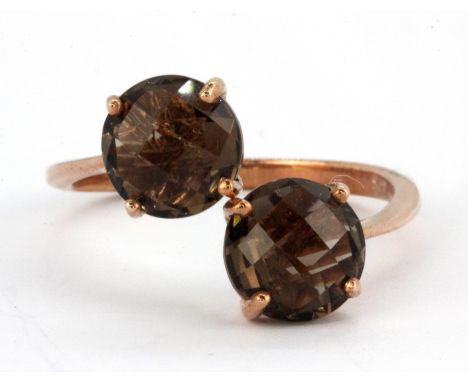 A 925 silver rose gold gilt adjustable ring set with faceted cut smokey topaz.