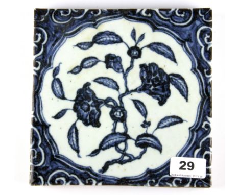 A Chinese hand painted porcelain tile panel, 19.5 x 19.5cm.