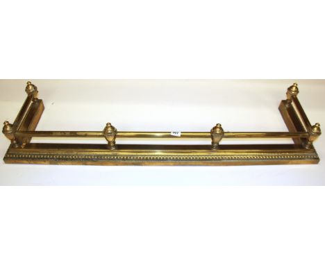 A gilt brass fender, L. 138cm.