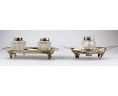 An Asprey hallmarked silver inkwell engraved to top and a Walker &amp; Hall hallmarked silver inkwell, longest L. 18cm.