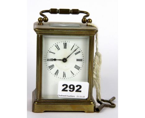 A brass carriage clock, H. 14cm.