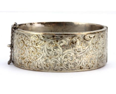 A hallmarked silver bangle, L. 6cm.