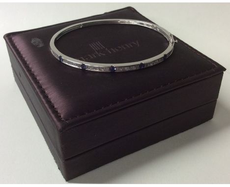 A good quality diamond bangle with concealed clasp. Approx. 12.2 grams. Est. £400 - £500.