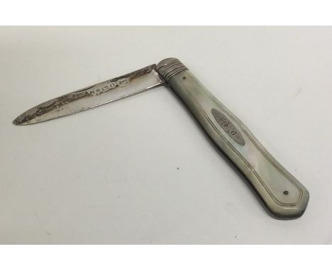 A small silver and MOP fruit knife. Sheffield. By John Nowill. Approx. 27 grams. Est. £30 - £50.