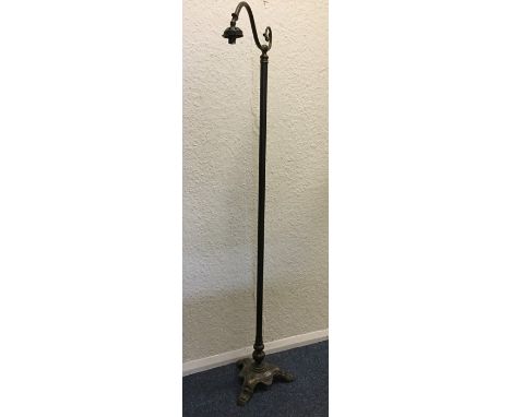 A brass lamp. Est. £30 - £50.