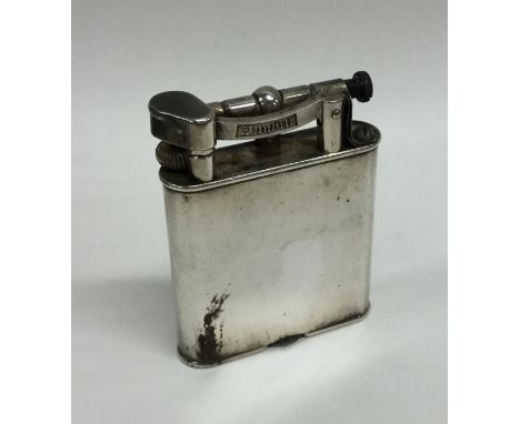DUNHILL: A plain lighter. Est. £50 - £80.
