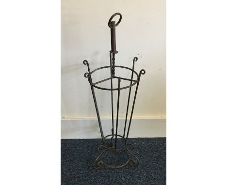 An unusual stick stand in the form of an umbrella. Est. £25 - £35.