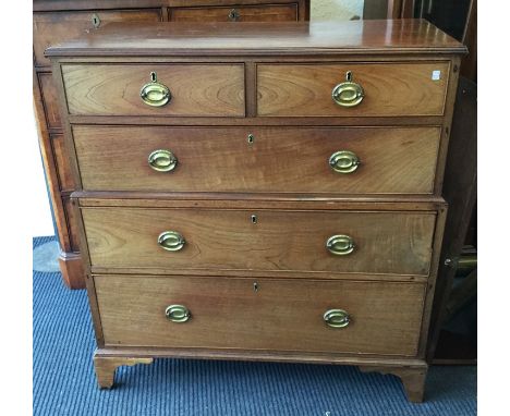 A mahogany chest of five drawers to bracket feet. Est. £40 - £60.
