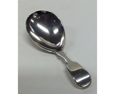 A Victorian silver fiddle pattern caddy spoon. London 1859. By George Adams. Approx. 12.5 grams. Est. £35 - £45.