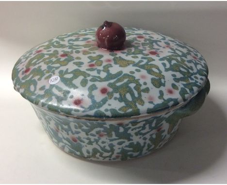 JANICE TCHALENKO (British: 1942 - 2018): A large lidded two handled stoneware dish in green 'Leopard' pattern. Approx. 25 cms